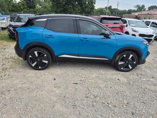2025 Nissan Kicks SR Intelligent AWD - Exterior Side Passenger